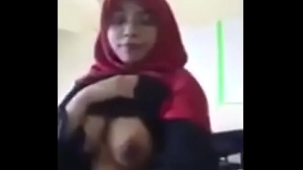 Big Busty Malay Woman Strips for the Camera tudung